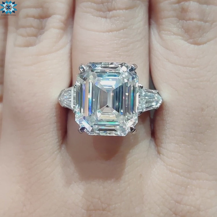 Buy moissanite ring with three stone layout in white gold.
