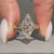 Vintage style marquise diamond ring with milgrain details.