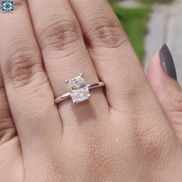Diamondrensu UK engagement ring with prong set radiant moissanite.
