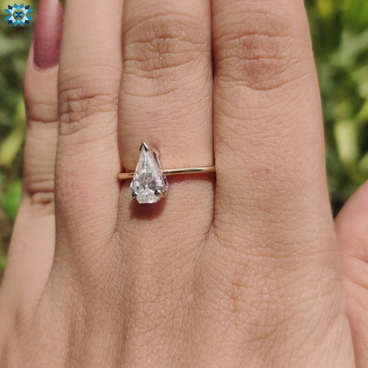 Handmade jewelry ring with spear cut moissanite.