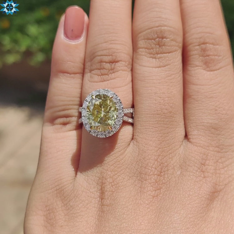 Oval shaped moissanite ring with double hidden halo setting.

