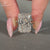 Lab grown radiant diamond ring with trellis setting style.