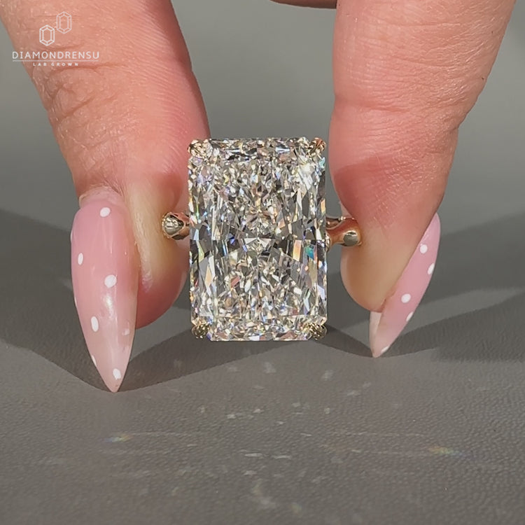 Lab grown radiant diamond ring with trellis setting style.