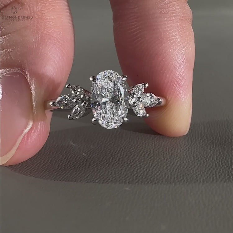 Marquise cut diamond ring with a 4 prong claw setting, ideal for an oval engagement ring or engagement ring UK.
