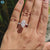 Marquise cut side moissanite paired with round moissanite side stones.
