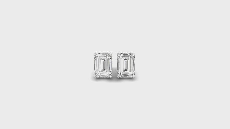 Lab grown diamond earrings in emerald cut finish.
