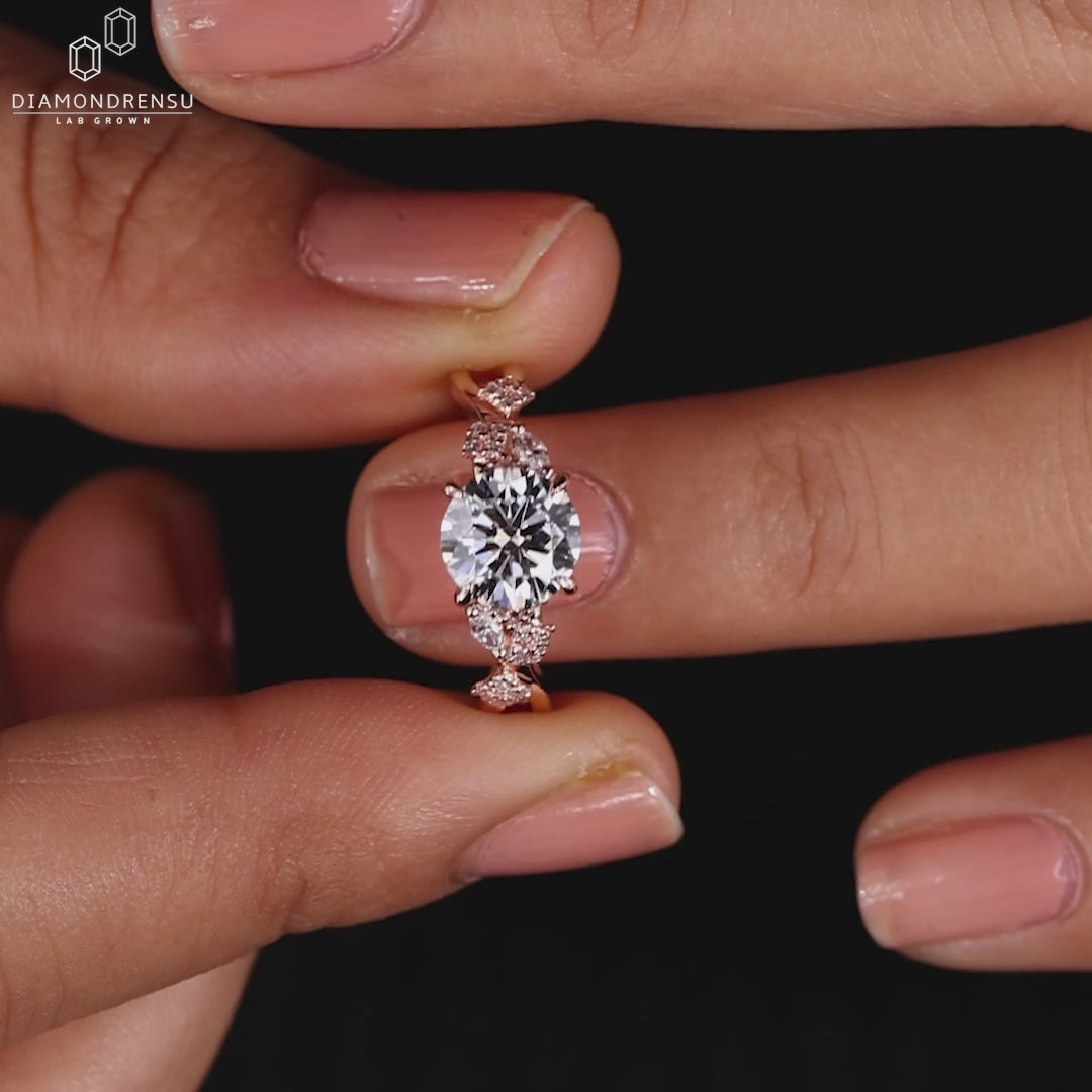 Model displaying an IGI certified round cut diamond ring with a sidestone engagement ring design.