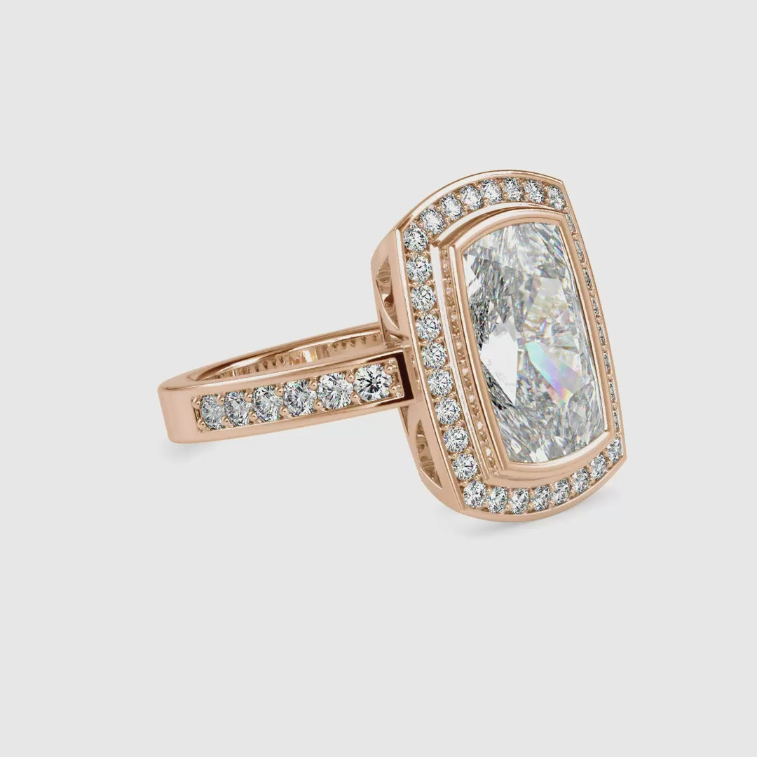 Beautiful elongated cushion cut halo with a pave band for a classic look.