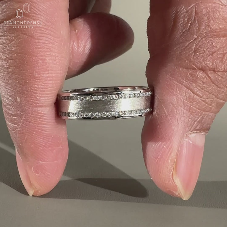 Half eternity mens ring crafted in white gold with a brushed finish.
