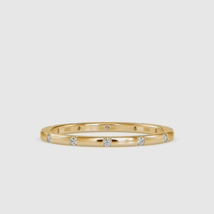 Lab grown diamond ring in eternity wedding design.
