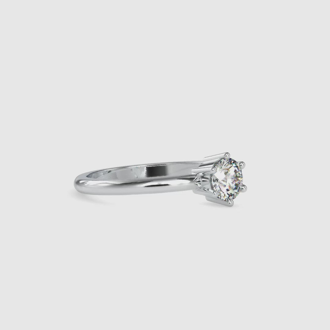 Stunning six prong round engagement ring with a lab grown diamond.