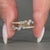 Yellow gold wedding band with round and baguette diamonds
