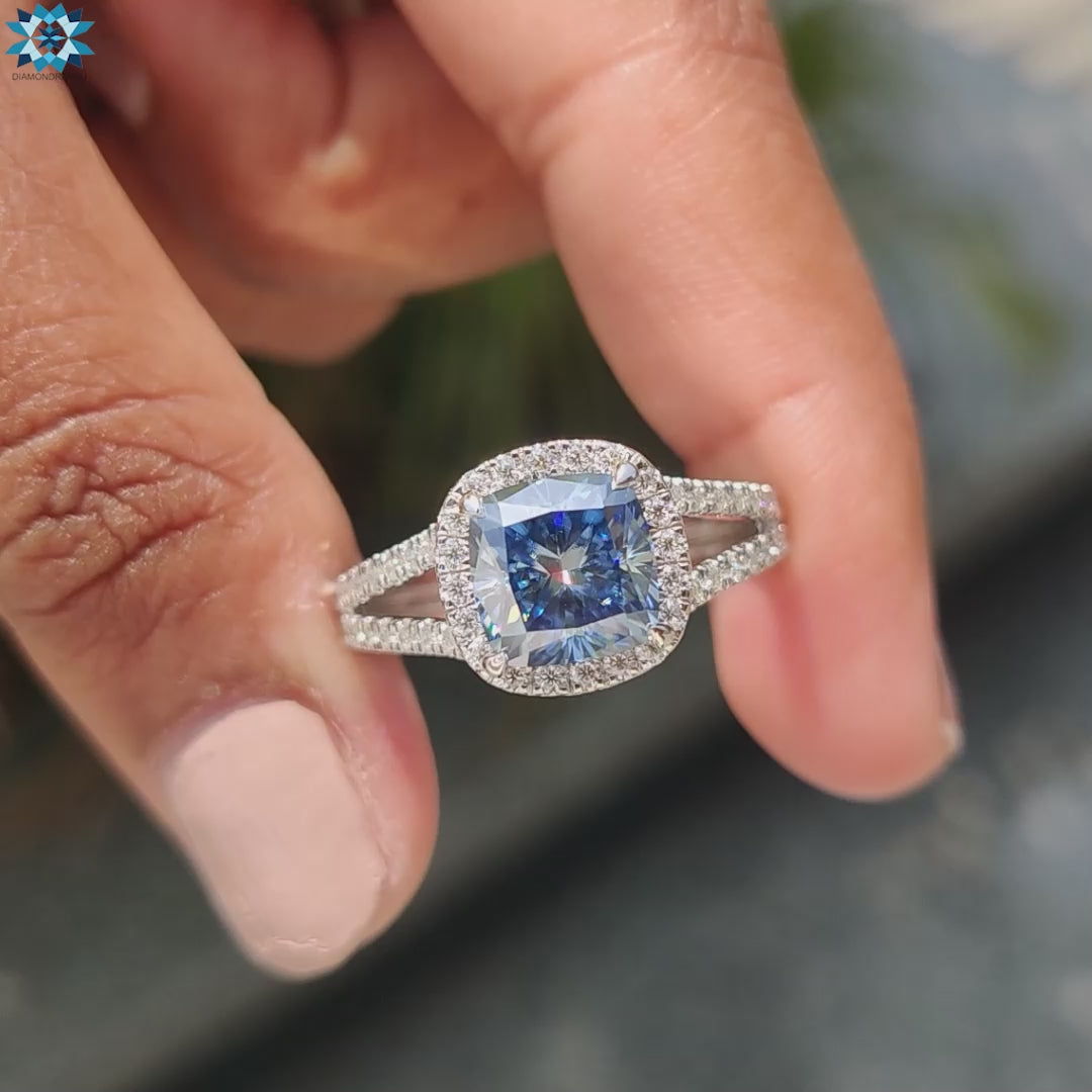 Cushion moissanite engagement ring featuring halo setting and 4 claw prong design.
