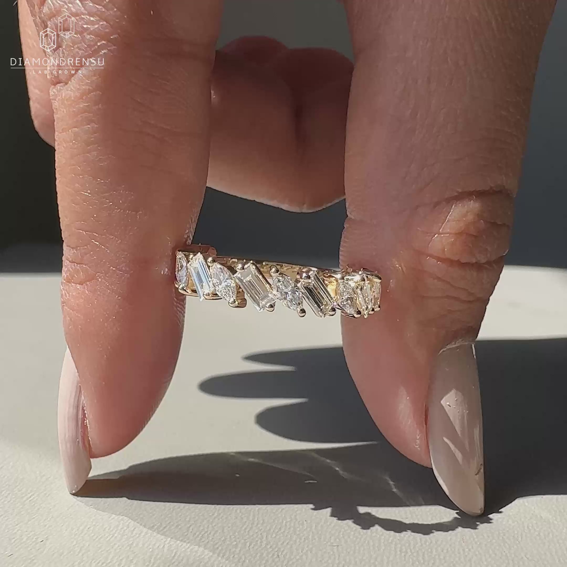 Yellow gold half eternity wedding ring.
