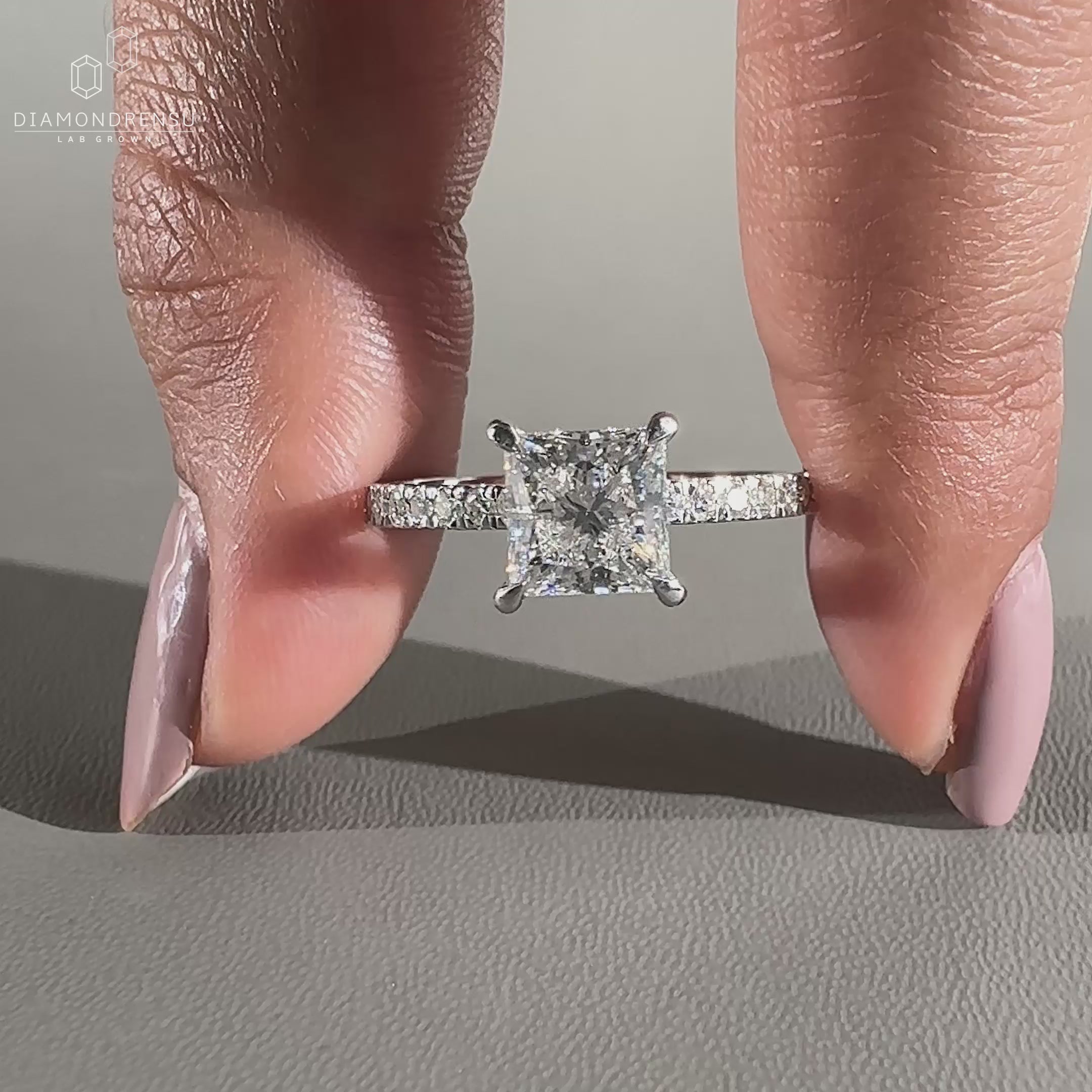 Pave setting ring with round cut diamond band.
