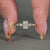 Radiant cut ring set in yellow gold.
