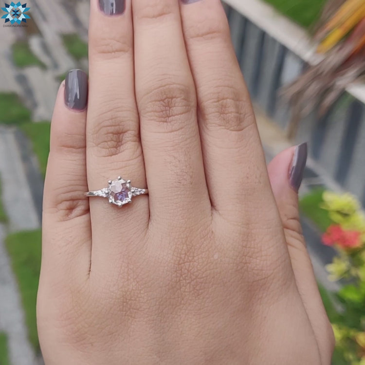 Custom Moissanite ring with Muse design and white gold craftsmanship.
