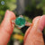 Rose gold ring with Portuguese cut moissanite center stone.
