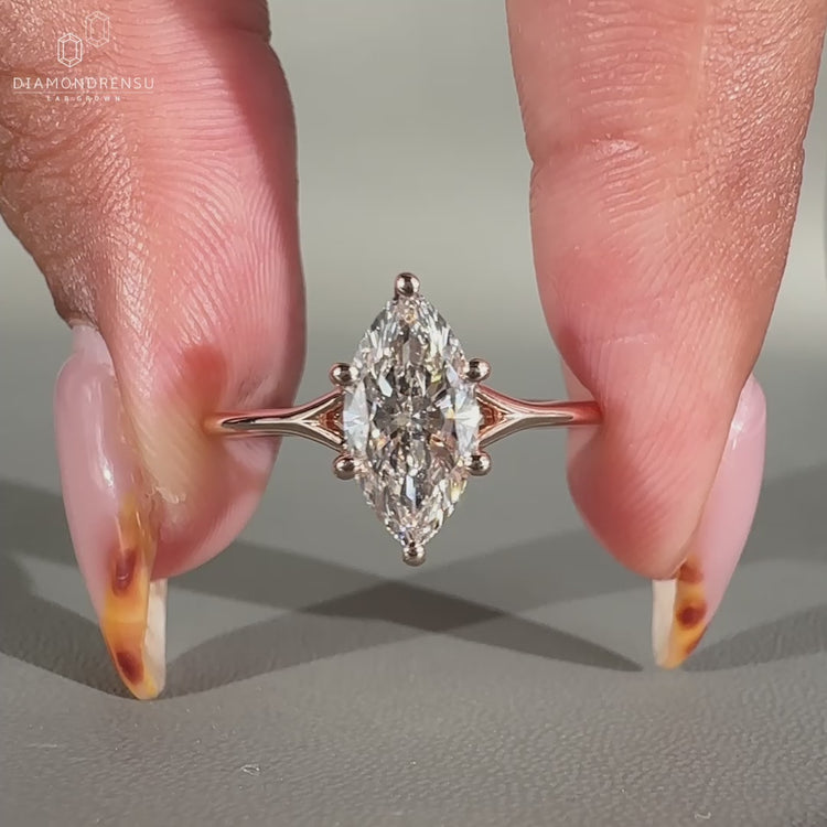 Solitaire marquise diamond ring with prong setting