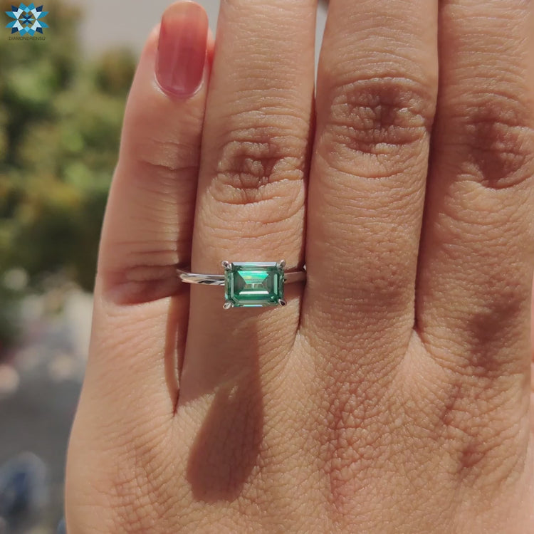 Diamondrensu UK emerald cut moissanite engagement ring.

