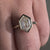 Bezel set engagement ring in yellow gold engagement ring style.
