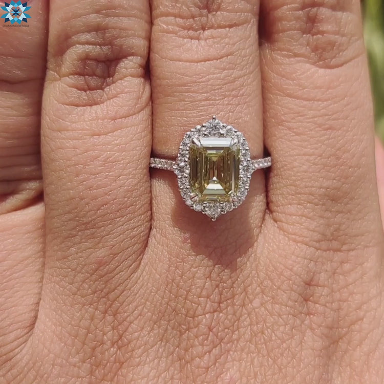 Moissanite engagement ring with vintage style pave accents.
