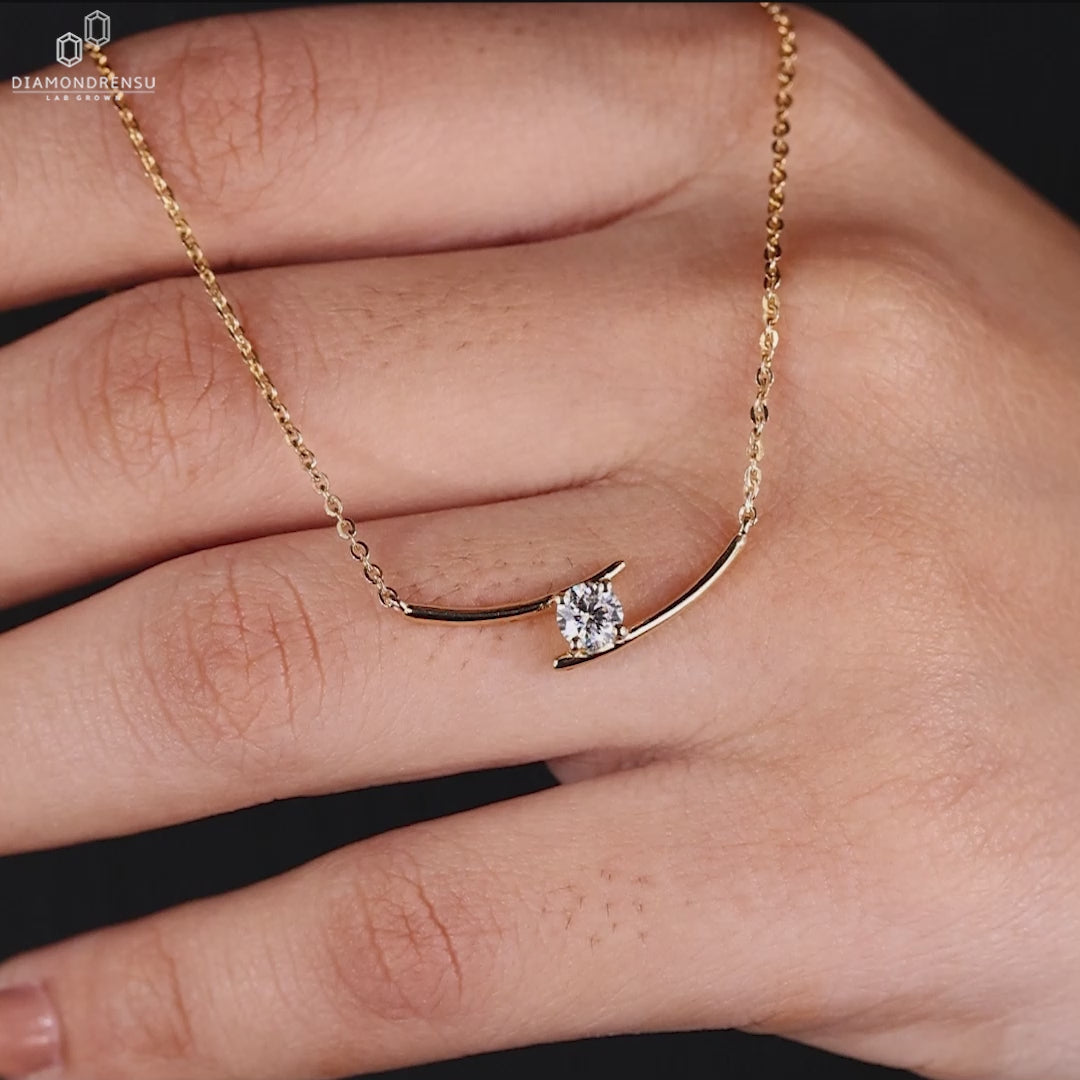 Solitaire diamond pendant handmade with Lab Grown Diamond in a bypass style.
