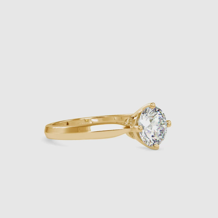 Handmade lab grown engagement ring with compass prong.

