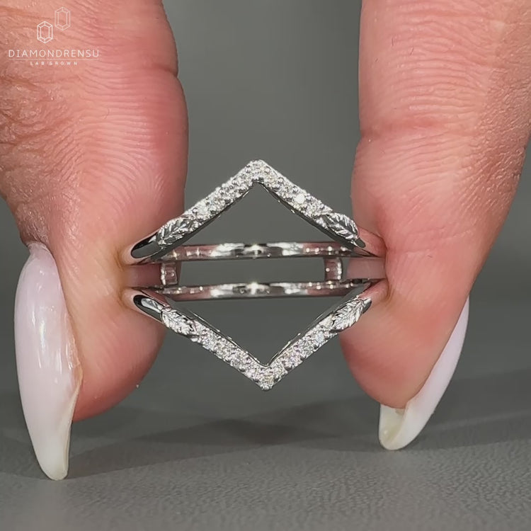 Wrap guard wedding band designed for ring stacking.
