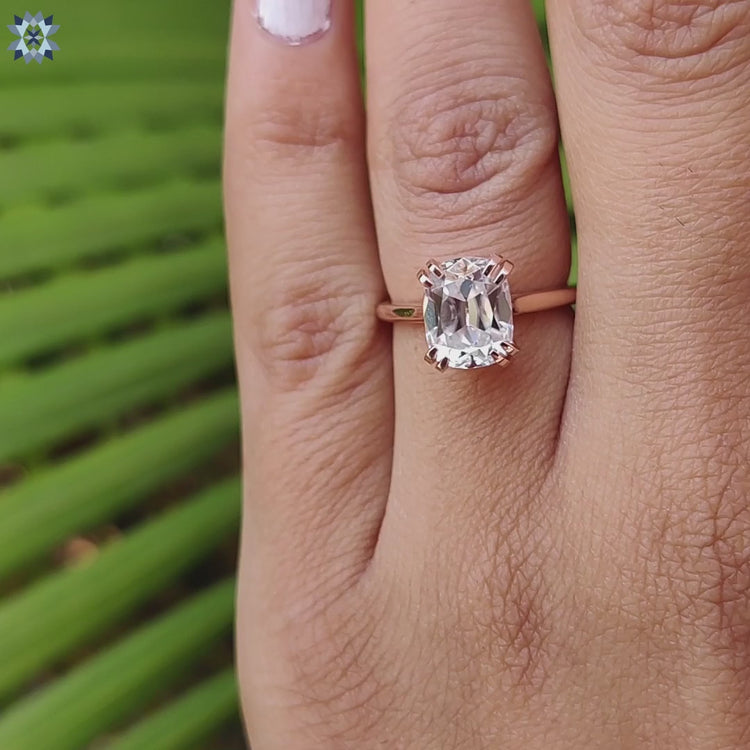 Buy moissanite ring with old European cut cushion center.
