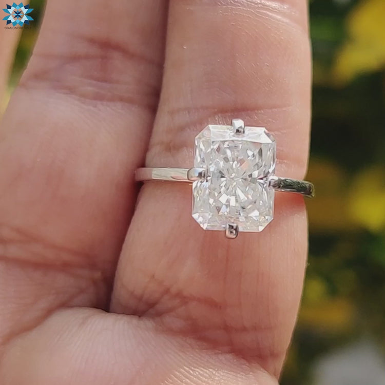 White gold custom engagement ring with moissanite.
