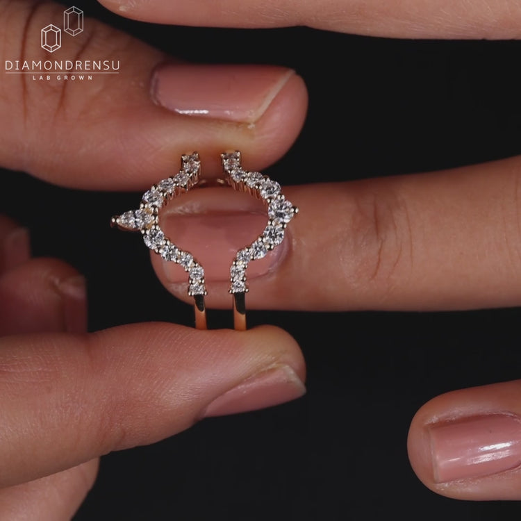 Marquise and round diamond curved wedding band.
