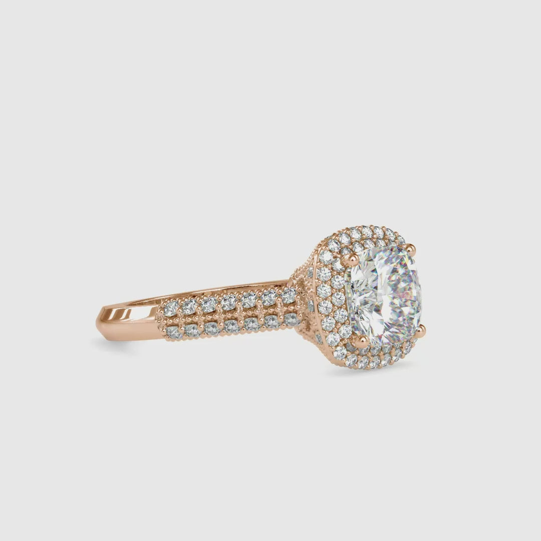 Stunning cushion cut diamond in a knife edge pave setting for extra brilliance.