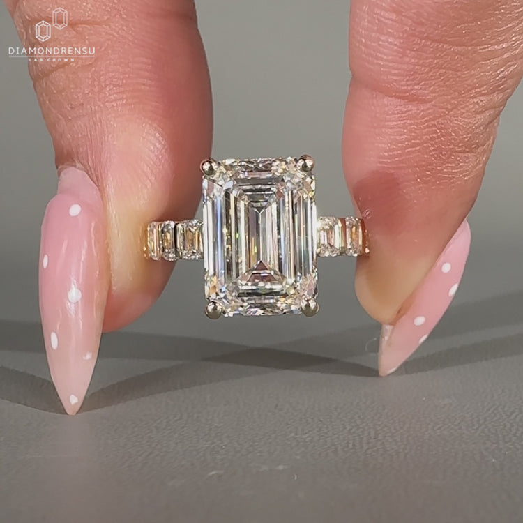 Handmade emerald cut ring with four prong setting.
