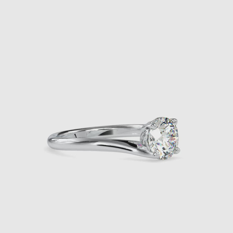 Handmade jewellery ring with bypass band and diamond.

