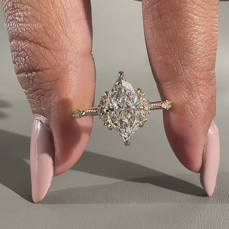 Vintage dutch marquise ring with milgrain and round accents.