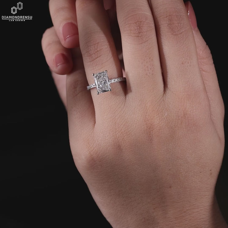 Diamondrensu UK ring with a radiant cut diamond and pave band, a perfect engage ring UK option.