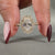 This oval diamond ring includes a halo diamond ring for an eye-catching design.

