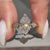 Dutch marquise engagement ring with three stone style.