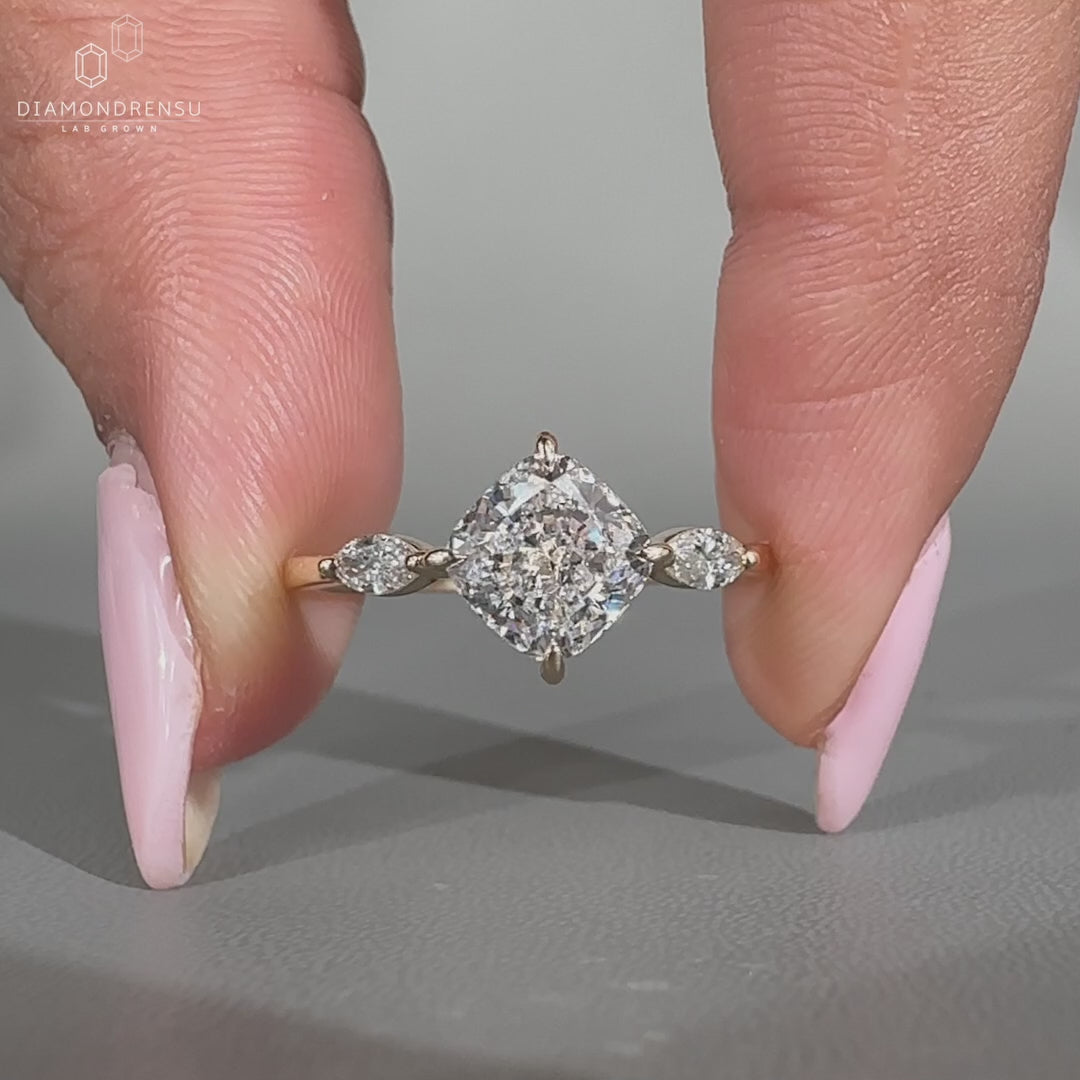 Cushion cut diamond ring with a soft, elegant shape.
