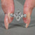 Marquise diamond engagement ring with six claw prong set and pave band.
