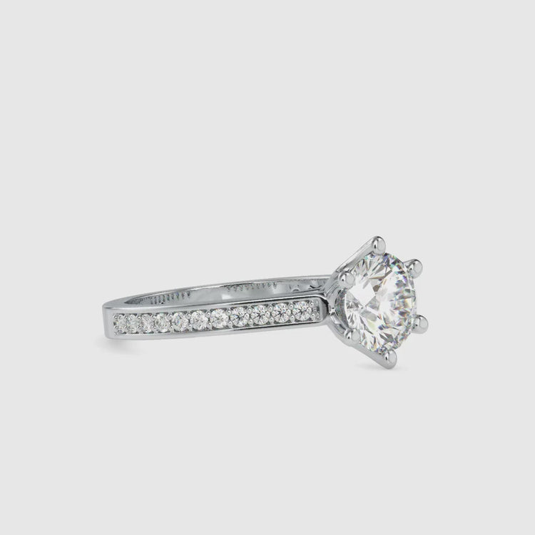 Round cut pave band paired with channel ring in yellow gold.