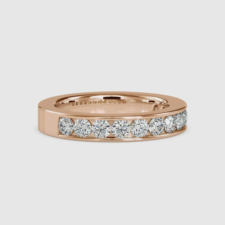 Round cut diamond channel band by Diamondrensu UK.