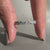 Milgrain setting round diamond eternity band.
