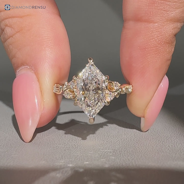 Nature inspired Dutch marquise ring with leafy filigree.