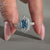 This radiant cut ring includes a halo diamond ring with pave setting ring.
