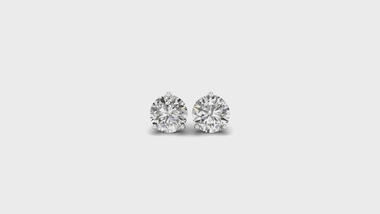 White gold diamond earrings in classic martini style.
