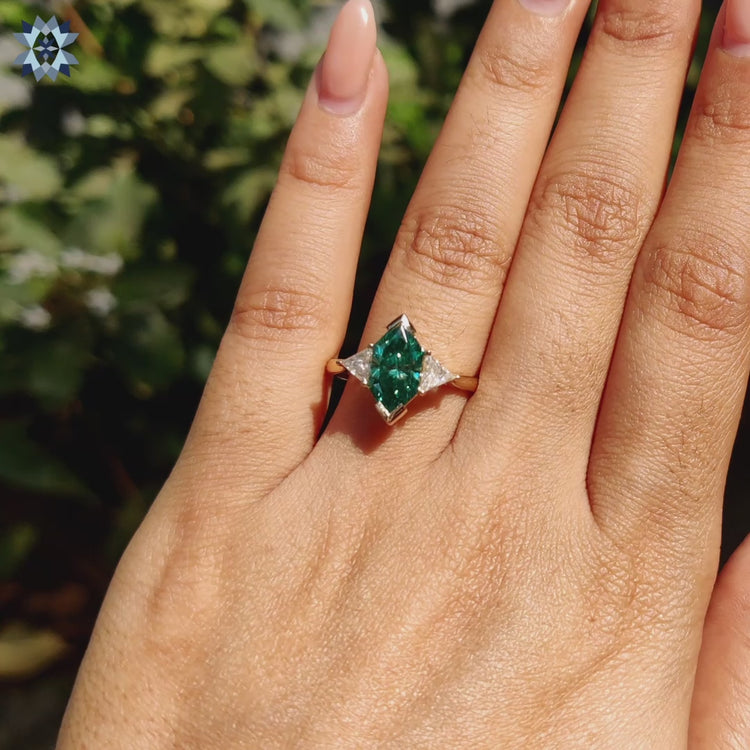 Dutch marquise centre stone ring in yellow gold with tapered shank and prong setting.
