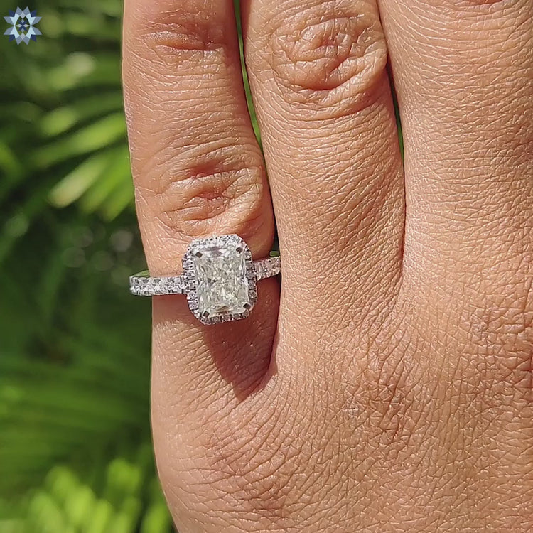 Handmade jewelry featuring radiant cut moissanite.
