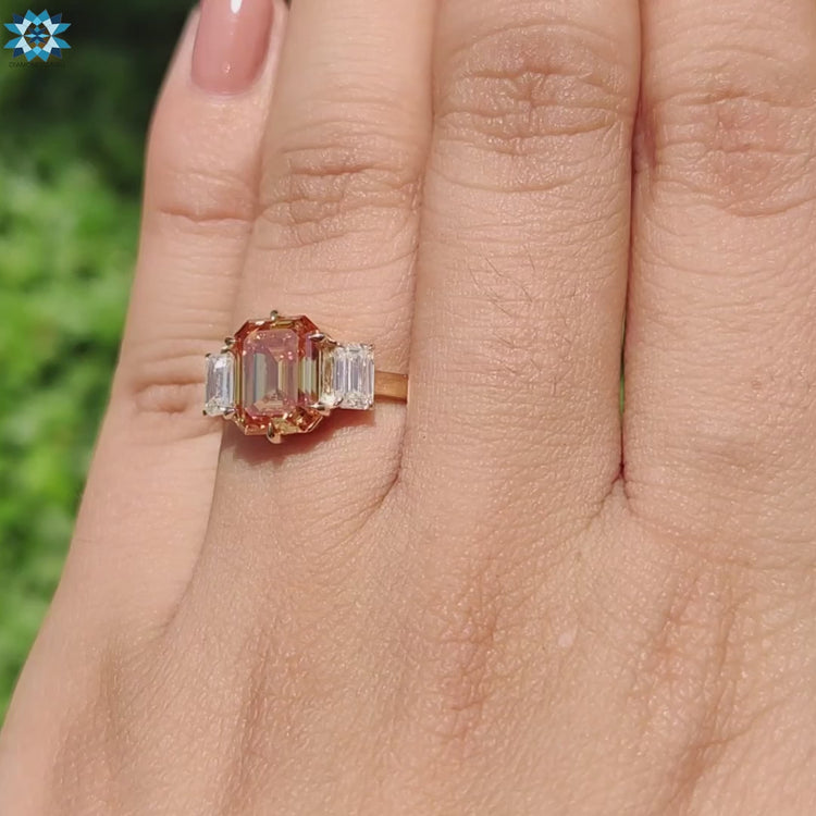 Yellow gold ring with moissanite side stones.
